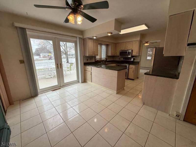 Nestled in the serene embrace of Woodbridge Township, this charming 5 bedroom, 2 bathroom raised ranch invites you to envision your dream home.