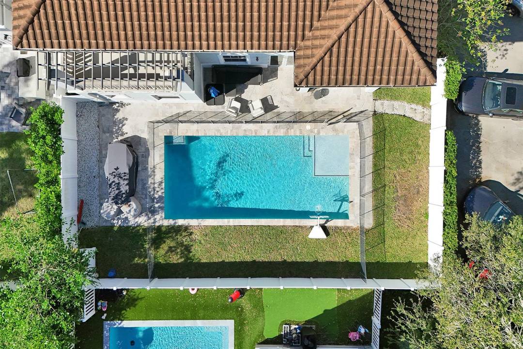 STUNNING 5 BEDROOM 4 BATH WITH HEATED POOL IN FOREST VIEW.