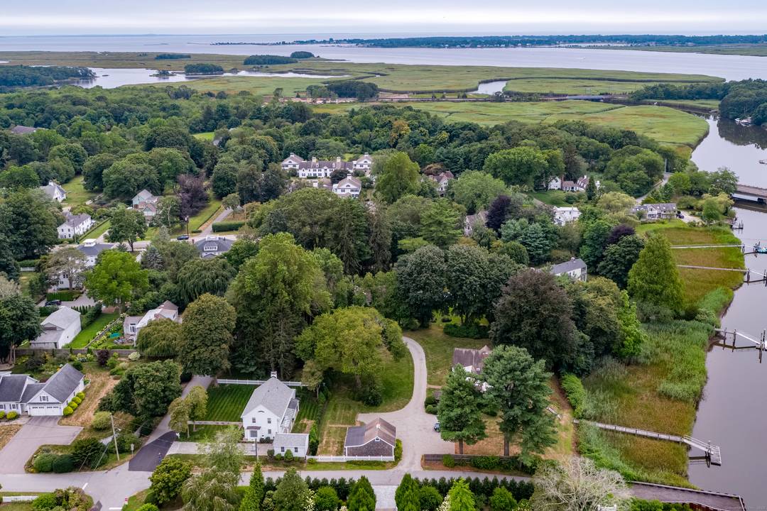 Welcome to 8 Lieutenant River Lane, an exquisitely renovated colonial in the heart of Old Lyme Village, where timeless charm meets contemporary luxury.