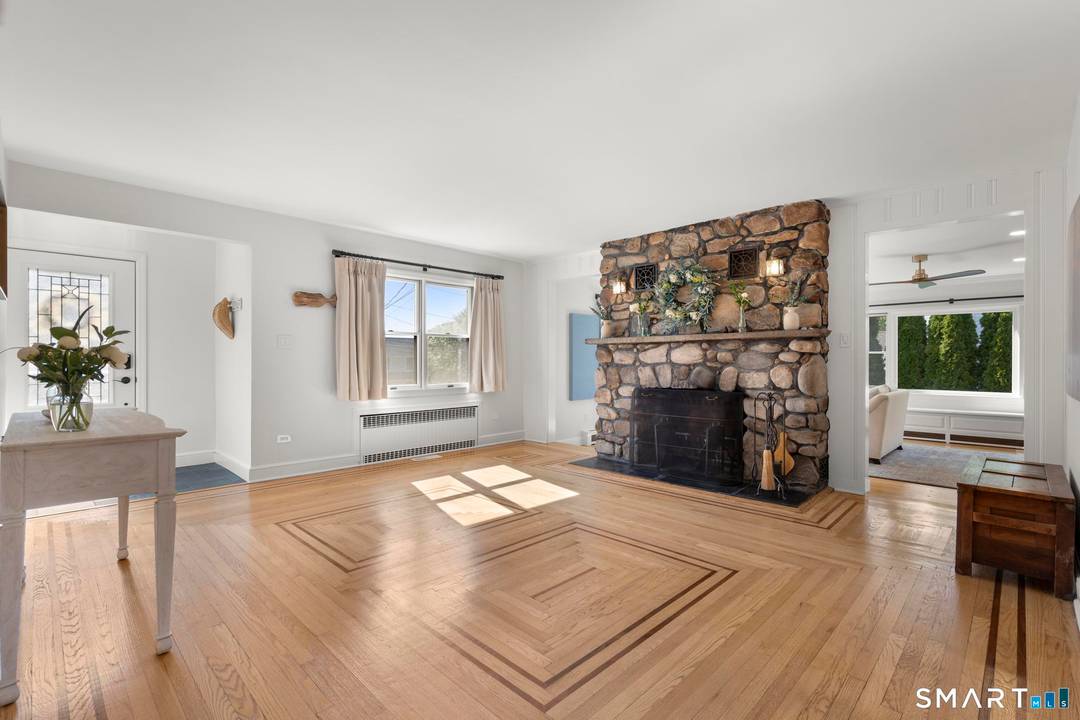 Ideally located in the highly sought after Sasco Hill neighborhood, this exceptional coastal home offers the rare advantage of beach area living outside the flood zone no flood insurance required.