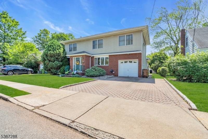 Welcome to this spacious and beautifully maintained home in the heart of sought after Sunnyside, Linden !