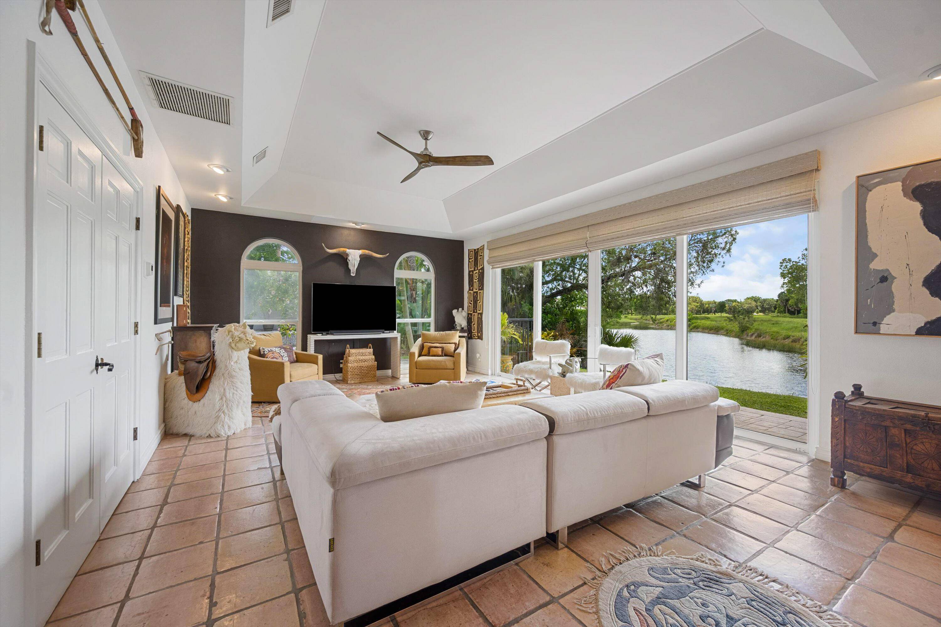 Secluded Waterfront Living in Palm Beach Polo Tucked away on one of the most private lots in Palm Beach Polo, this beautifully appointed ground floor residence offers serene waterfront views ...