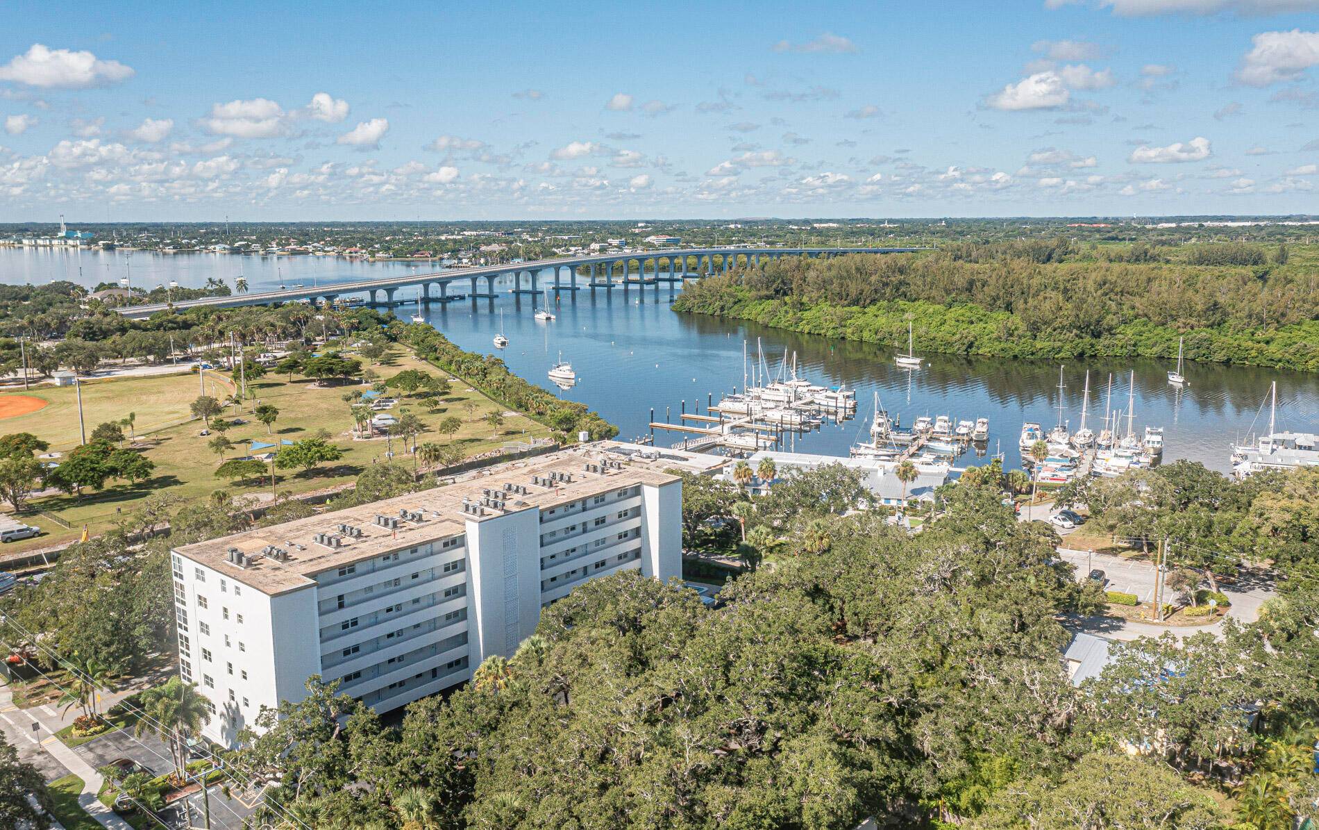 Spectacular 6th floor 2 bedroom, 2 bath condo offering stunning views of the Intracoastal Waterway and bridge from the glass enclosed 168 sq.