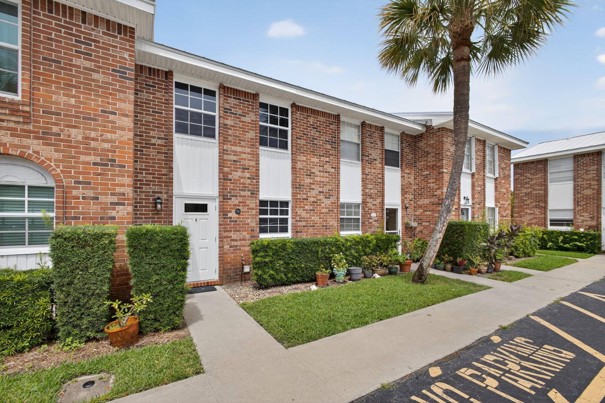 Stroll through the quaint village center of Tequesta from this updated 2 level, 2 bedroom towhhouse style condo in Wendimere Villas.
