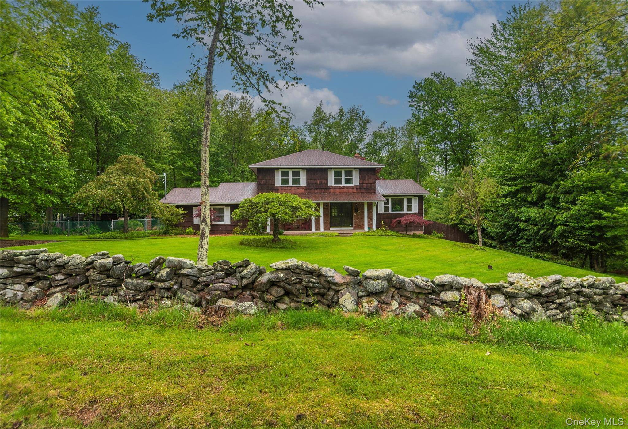 Charming Colonial Retreat with Pool on Nearly 2 Acres Monticello, NY Tucked away on a peaceful cul de sac in desirable Monticello, this inviting 4 bedroom, 2.