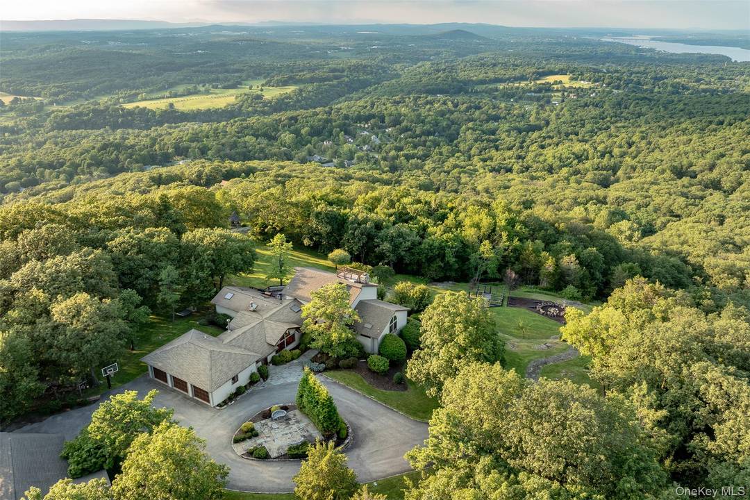 Welcome to Mountain Brook Estate, an ultra private, luxurious mountaintop retreat encompassing 26 acres on one of the highest elevations in the Hudson Valley.
