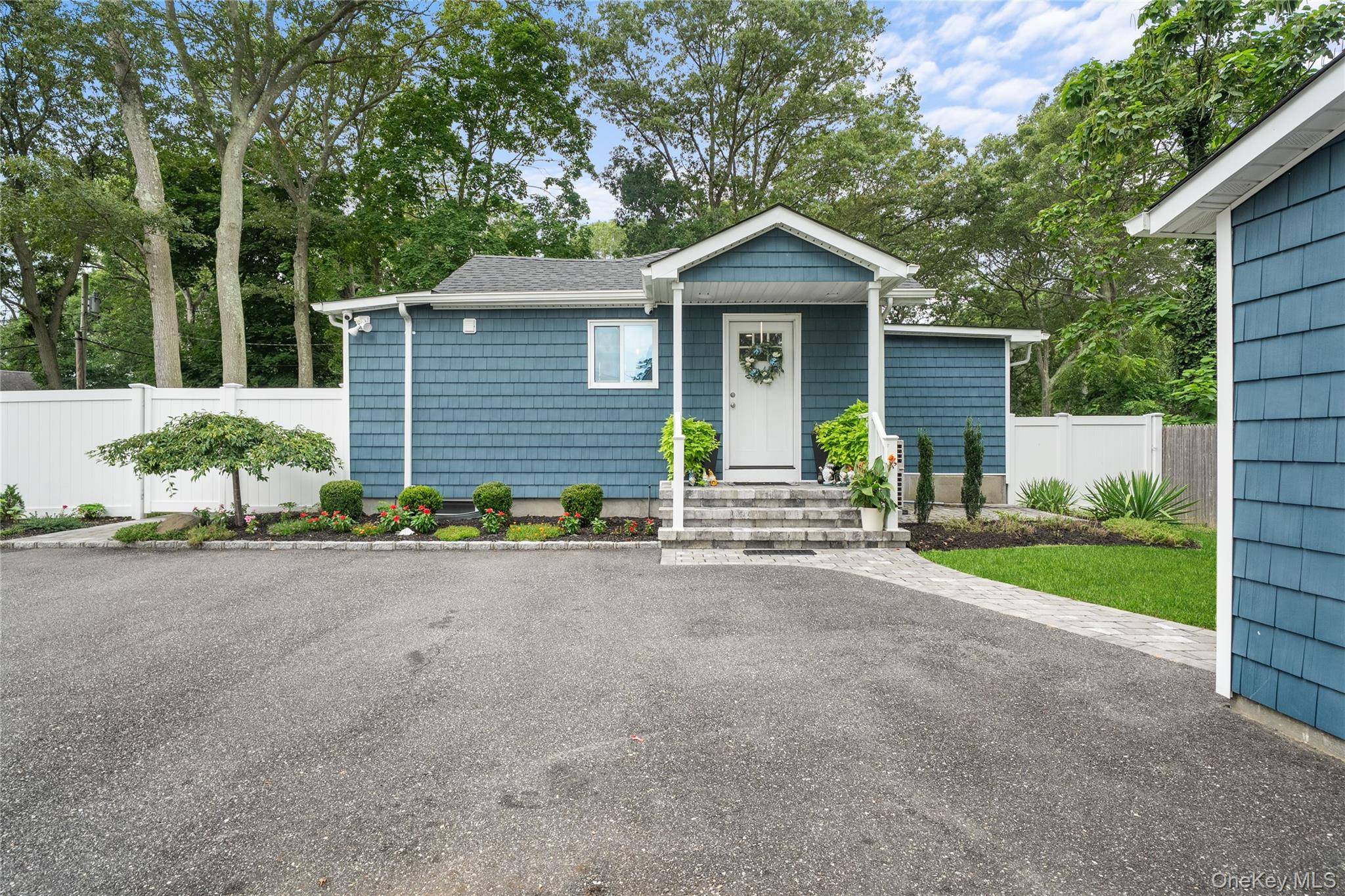 Welcome to 22 Lake Shore Drive, a beautifully renovated diamond ranch set on over half an acre of private, fenced grounds with ample room to expand.