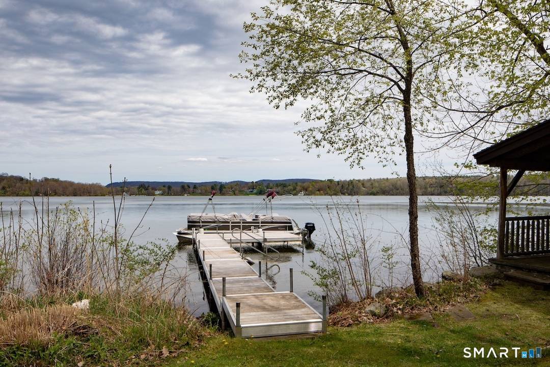 Escape to the ultimate summer retreat at this stylishly renovated 3 bedroom, 3 bath lakefront home on beautiful Lakeville Lake in Salisbury, CT.