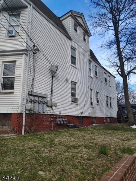 Large 3 Family home, in need of TLC, Lots of potential !