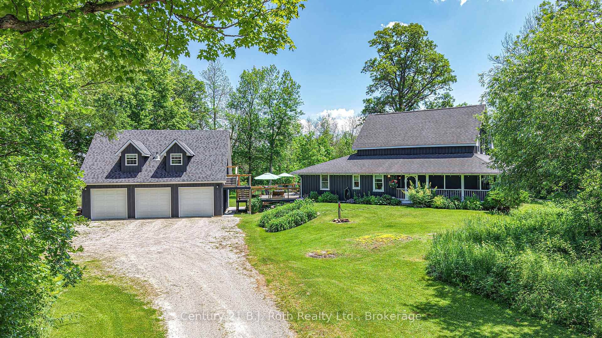 This extraordinary Century home is set on over 18 acres of peaceful, natural landscape.