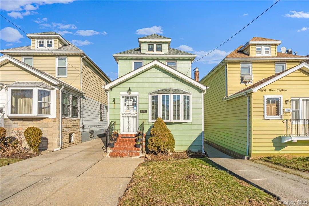 Classic detached Colonial with great potential.