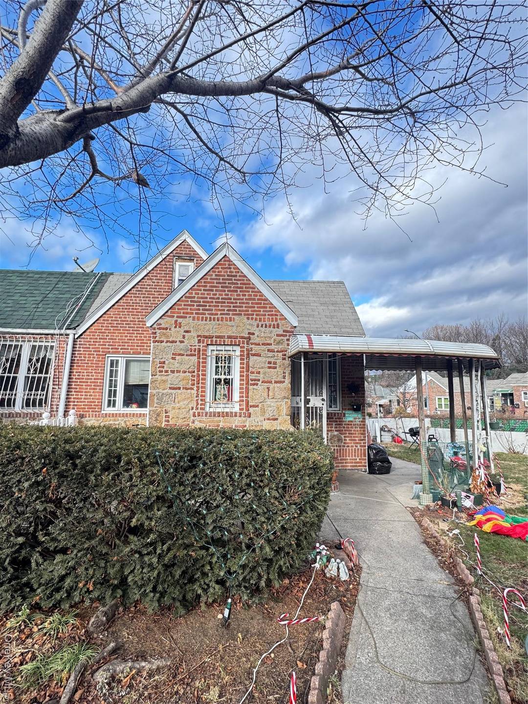 Welcome to this corner one family brick house in woodside.