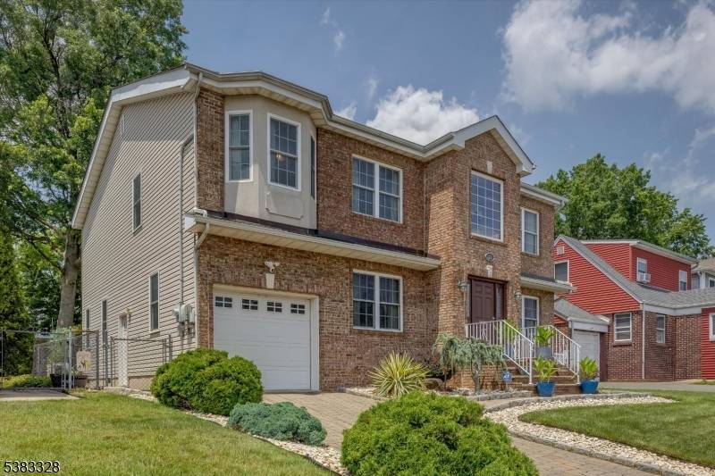 Welcome to this stunning custom built colonial home, perfectly blending comfort and style since 2004.