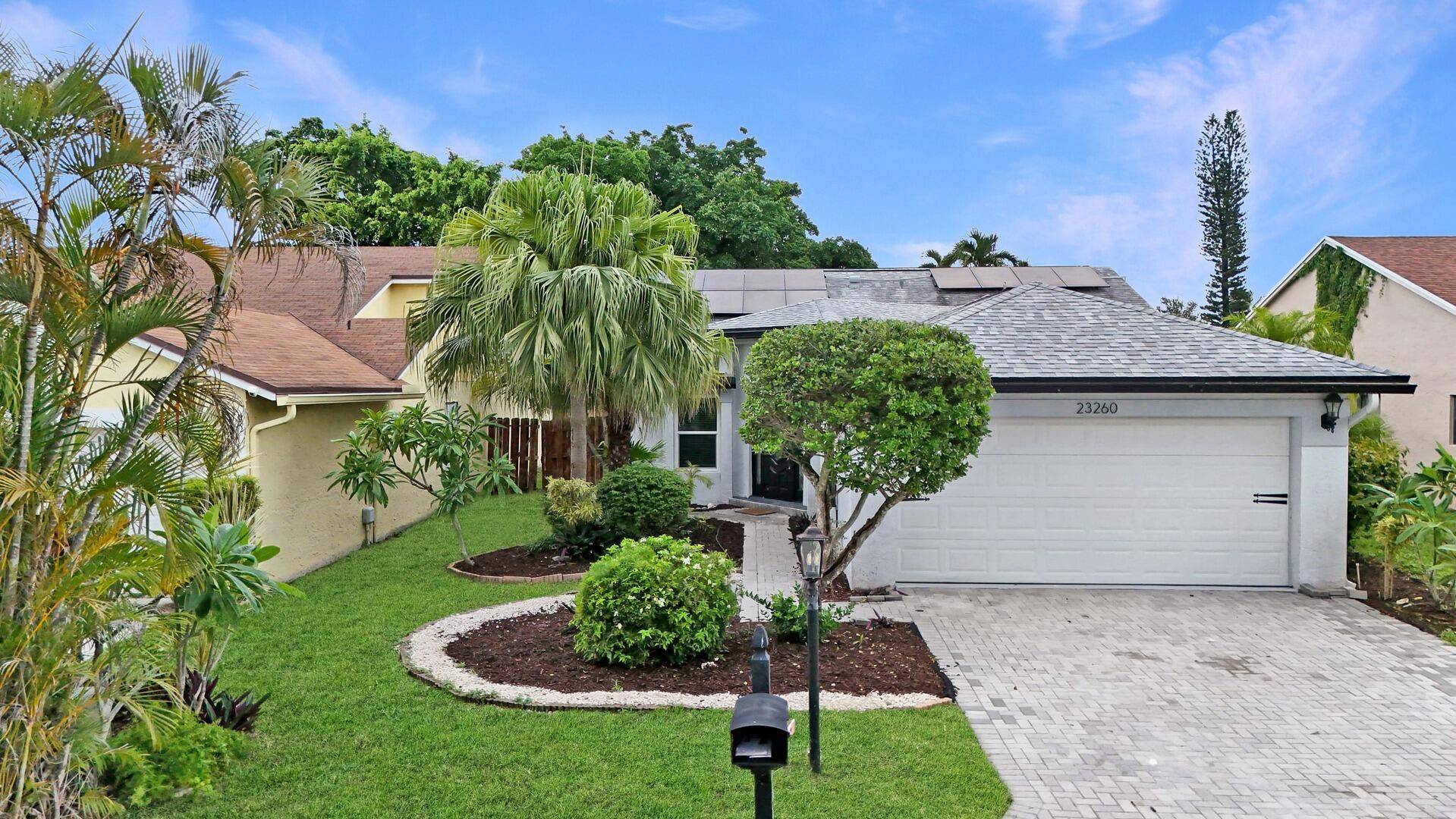 Welcome to this beautifully maintained 4 bedroom, 2 bath home in the desirable Boca Trace community.