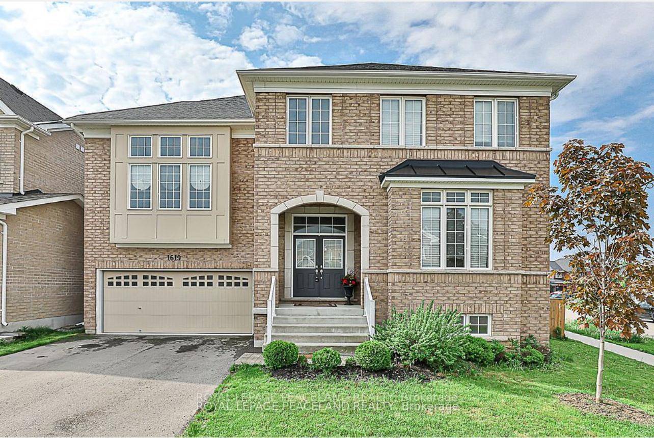 The Stunning 4 Bedroom Detached All Brick Home With Main Floor Office.