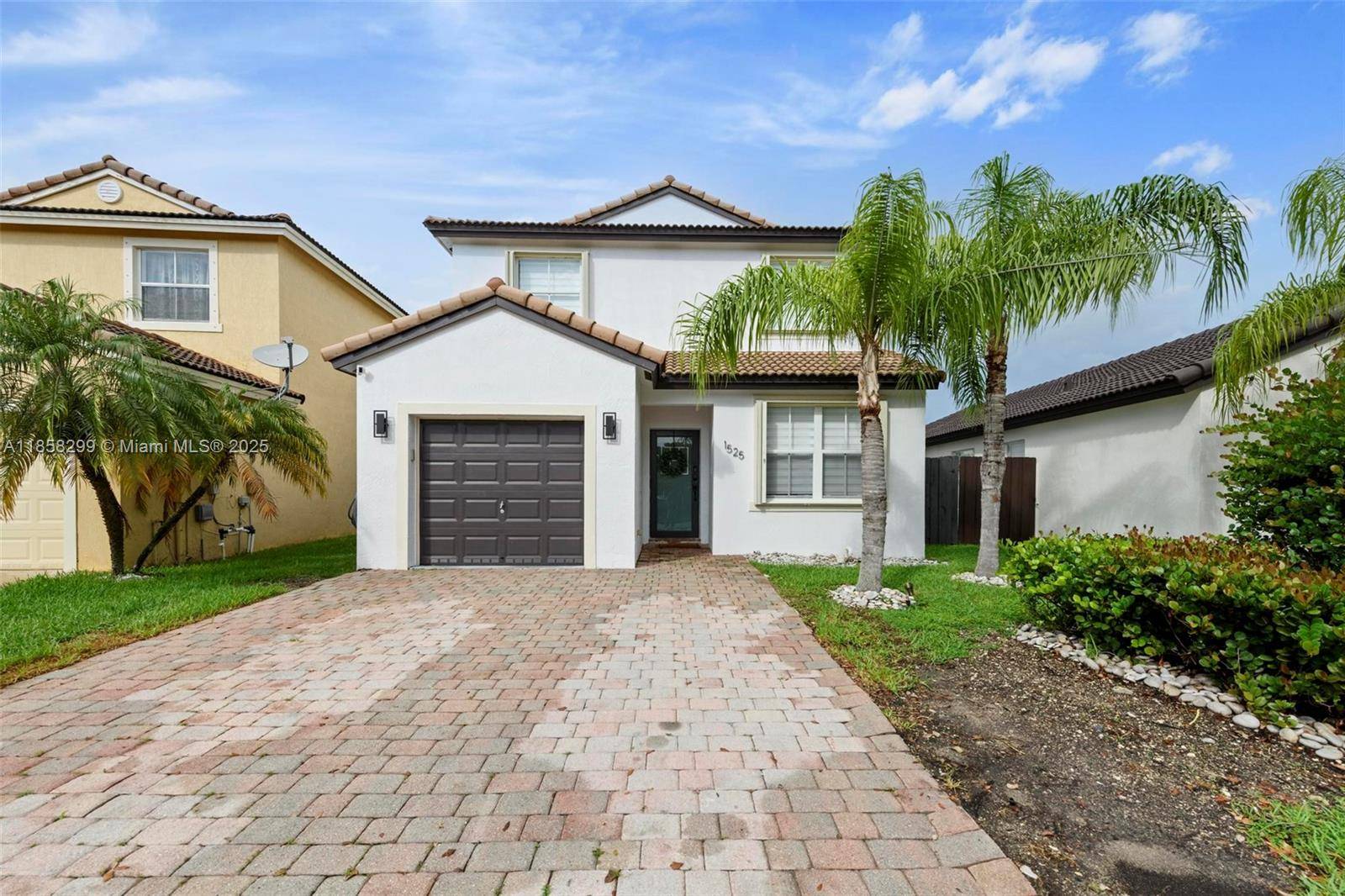 Beautiful 3 bedroom, 2 bath home in the gated Shores at Keys Gate community in Homestead.