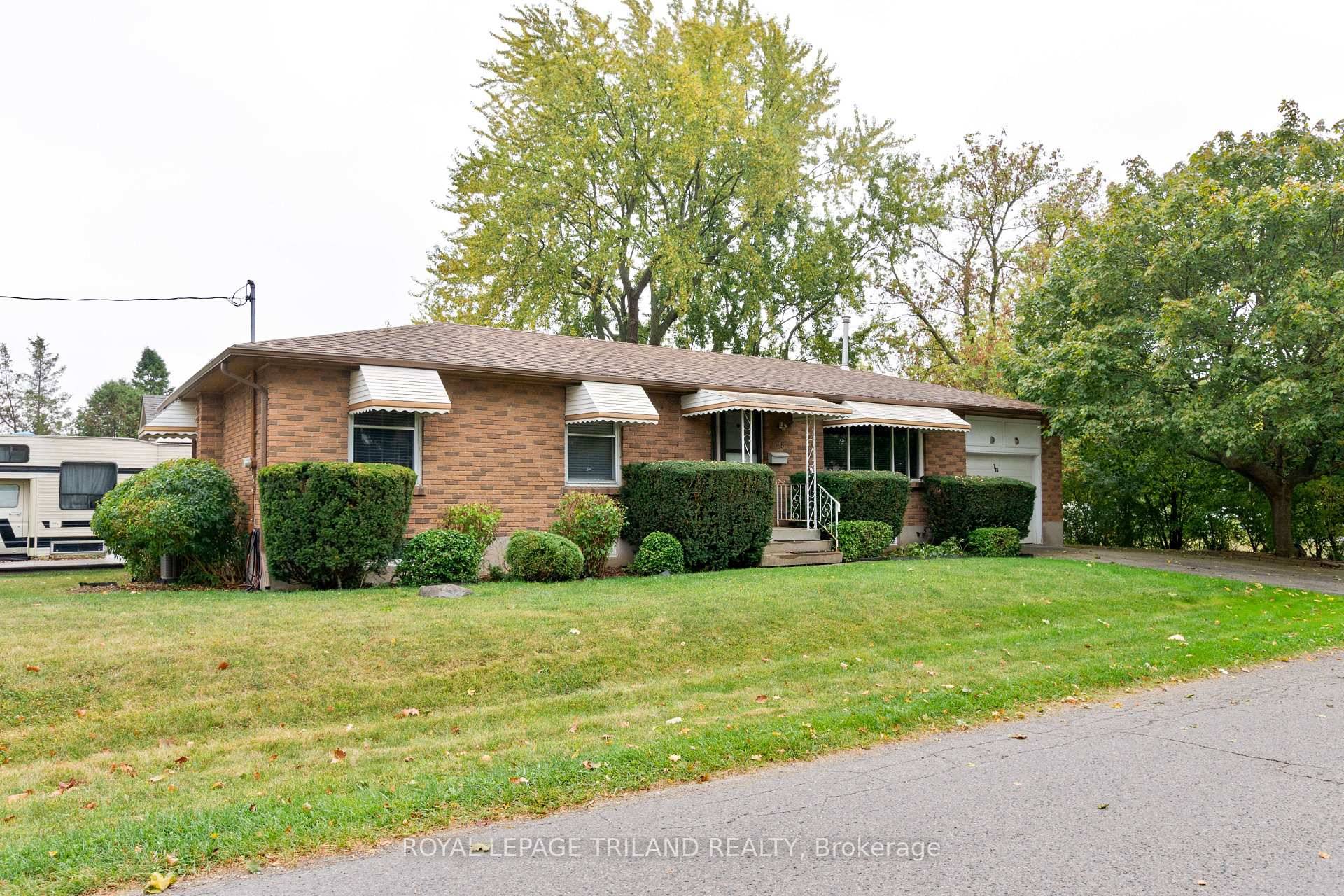 Charming brick bungalow offering true one floor living !