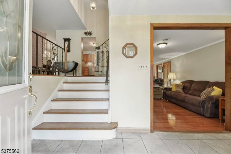 This beautifully maintained 3 bedroom Split Level home offers a bright, oversized living room flowing seamlessly into the dining area with French doors leading to the deck.