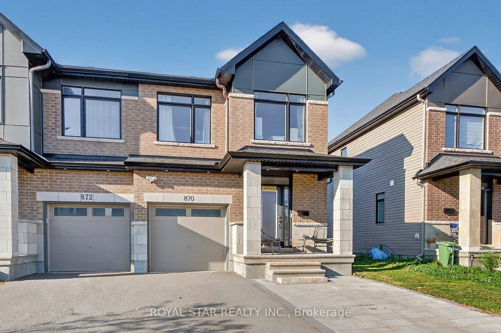 Welcome to this stunning end unit in one of Riverside Souths most desirable communities.