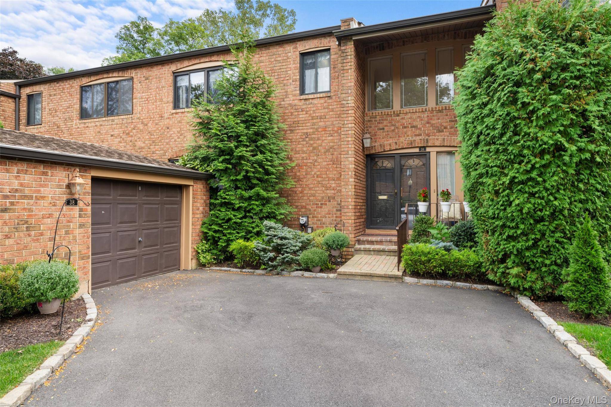 Welcome to The Gates at North Hills Where Luxury Meets Convenience Nestled in one of the most desirable communities in the area, this beautifully maintained condo townhouse offers the ideal ...