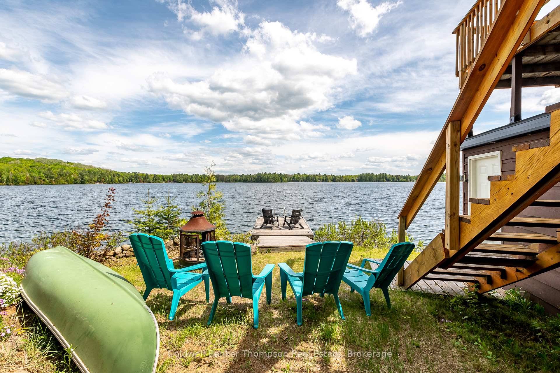Escape to the timeless charm of cottage life with this 4 bedroom, 4 season bungalow on the clear, sparkling shores of Clear Lake.