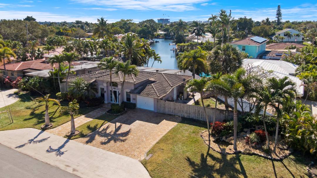Located in the highly sought after The Cove neighborhood of Deerfield Beach, this 2 bedroom, 2 bath waterfront home offers ocean access, a private dock, and is less than five ...