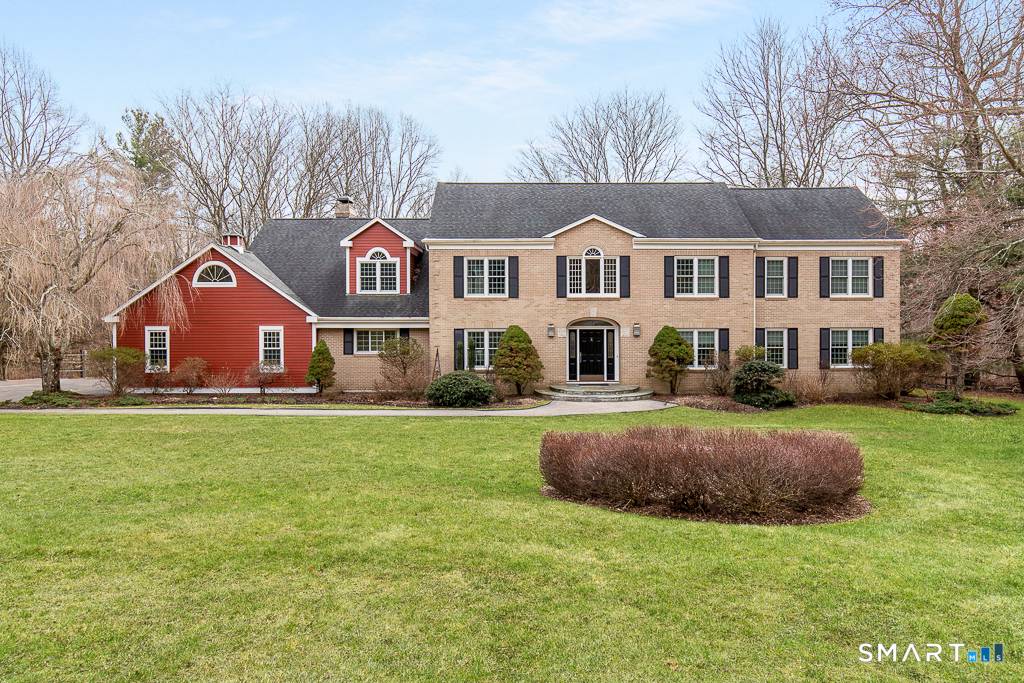 Grand scale suburban serenity converge in this commanding Colonial, rising gracefully within one of Woodbridge's most coveted cul de sacs.