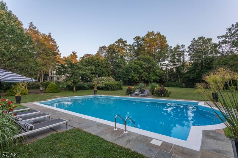 An innovative blend of classic architecture and modernist detail distinguishes this renovated custom residence with equestrian facilities.