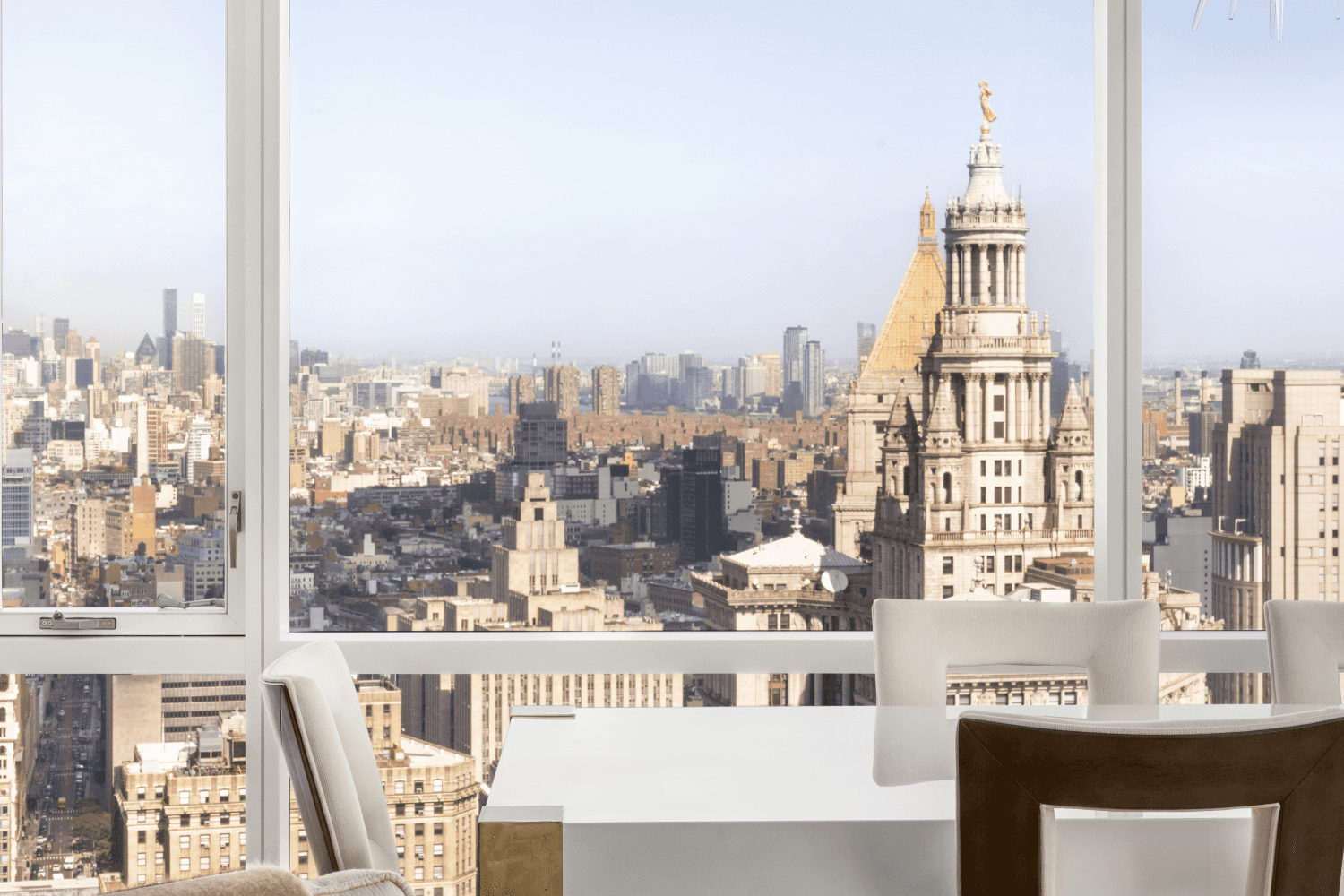 Enjoy breathtaking panoramic views of the East River, Brooklyn Bridge, and city skyline in this stunning 2 bedroom, 2.