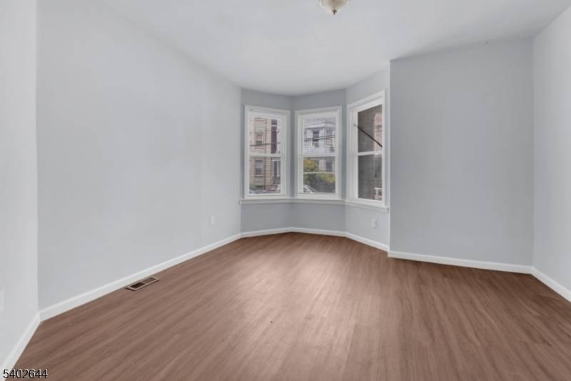 Welcome to this spacious and well maintained multi family home, perfectly situated just minutes from the heart of downtown Newark.