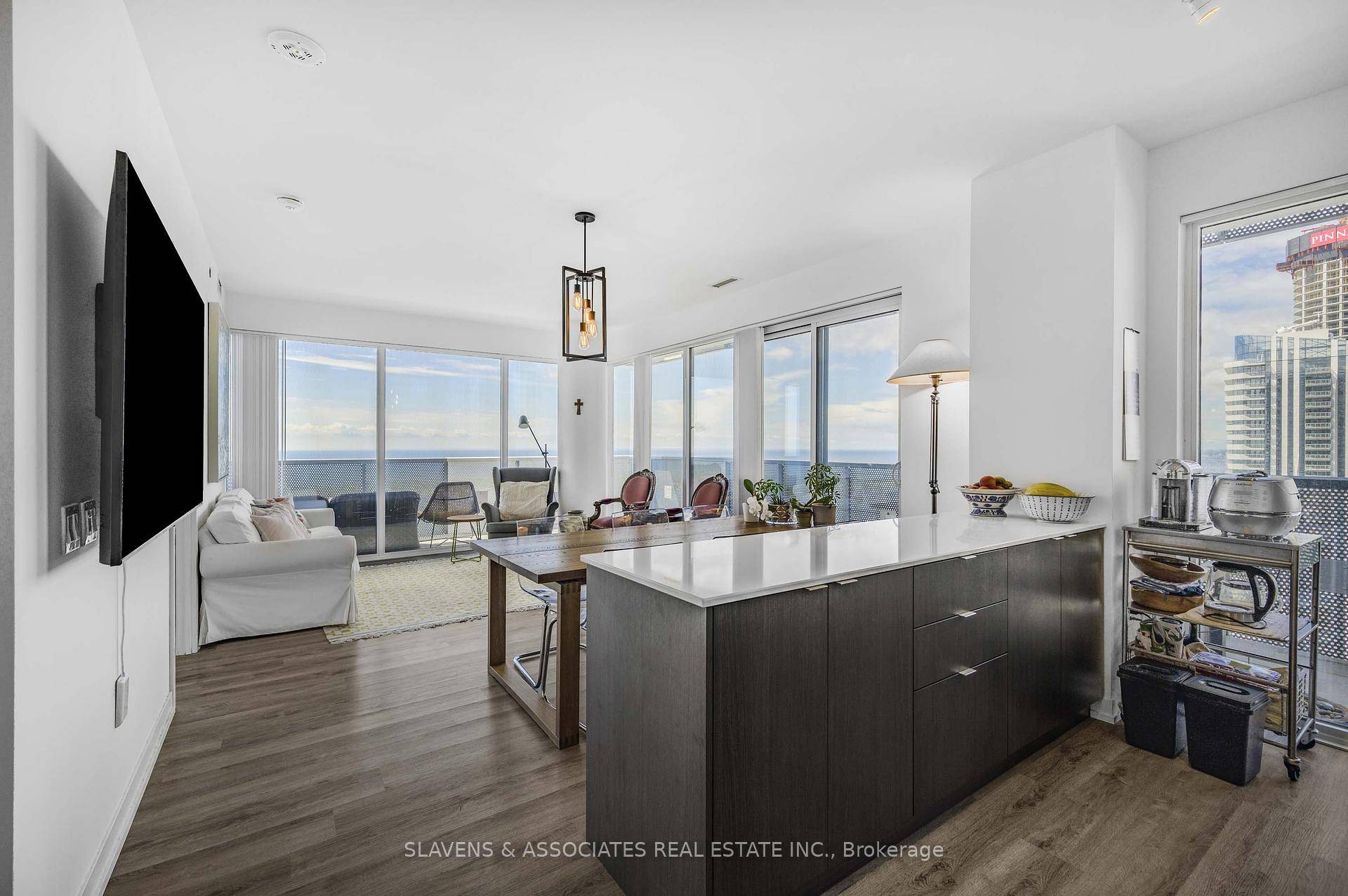 Gorgeous 3 Bed 3 Bath Condo spanning 1212 Sq Ft with unobstructed South View of Lake Ontario with a full view of the Toronto Islands.