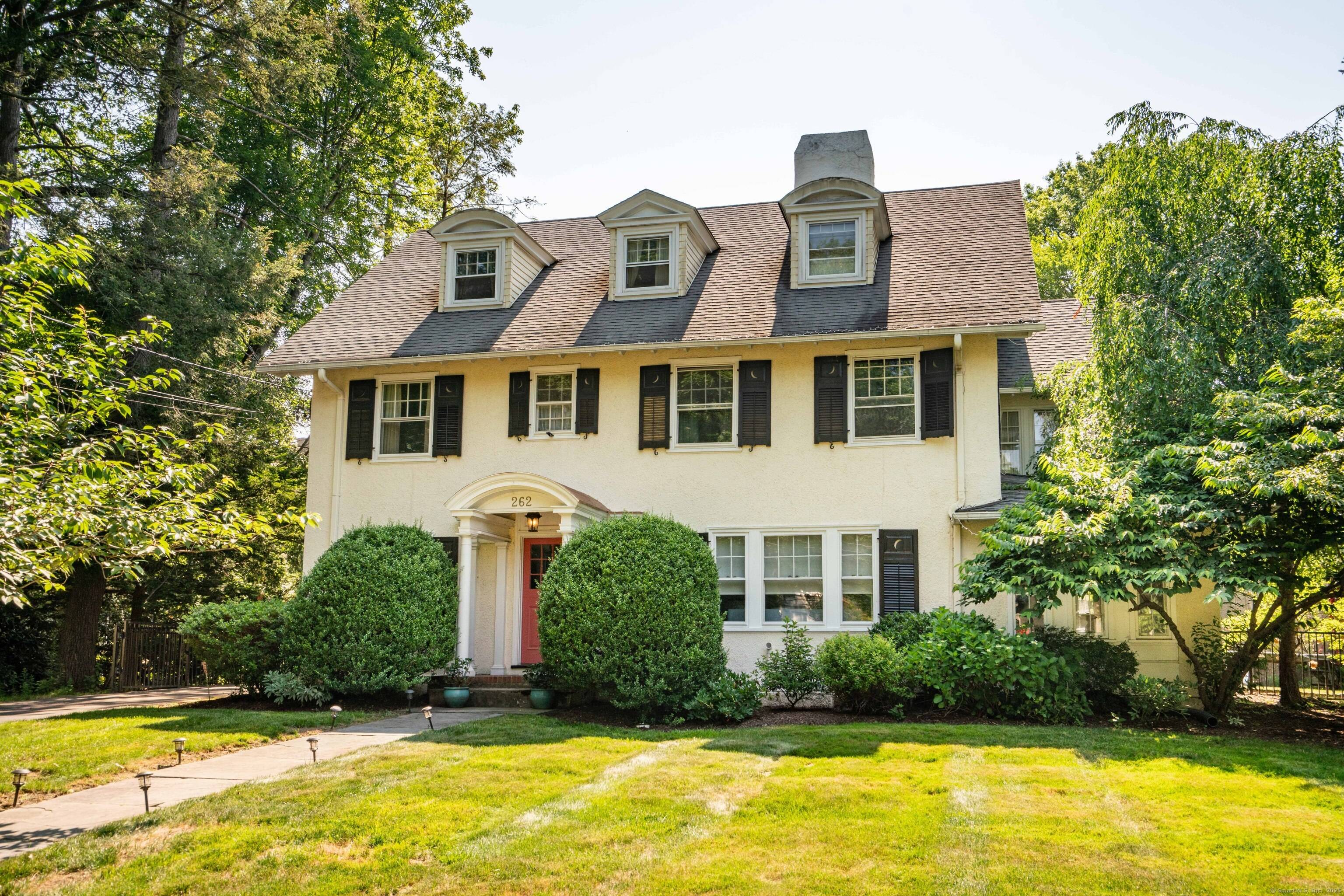Welcome to 262 Kenyon Street, where timeless elegance, thoughtful updates, and a prime location converge in one extraordinary home in the sought after West End neighborhood.