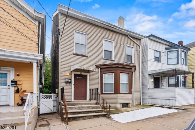 Take advantage of a rare opportunity to own this updated two family home with a mortgage rate as low as 5.