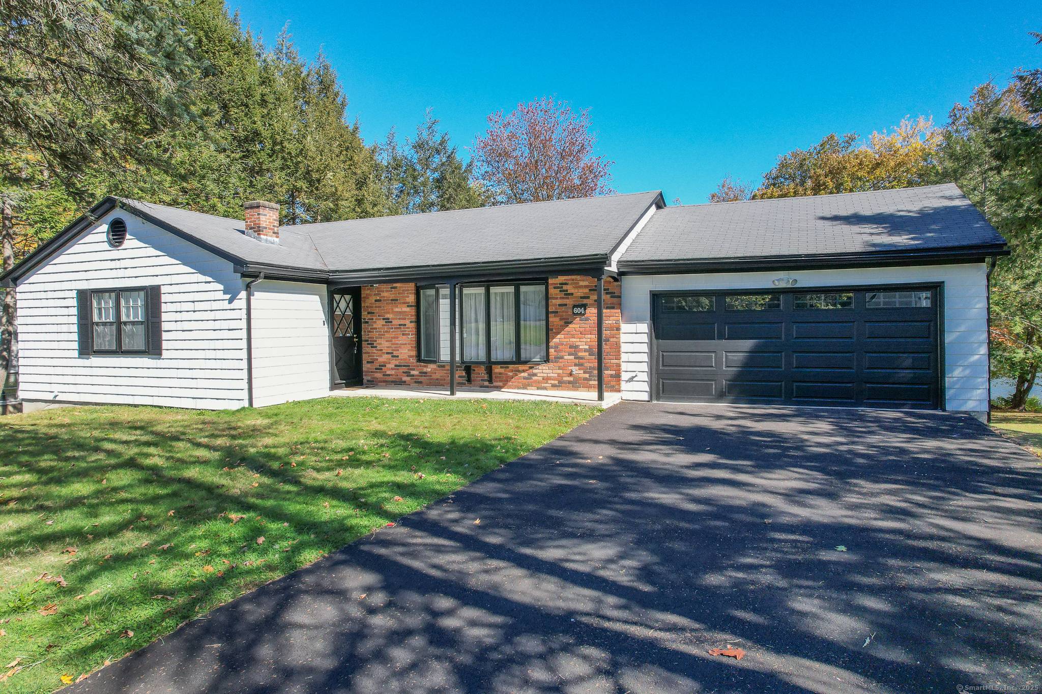 Enjoy the perfect blend of comfort and style in this stunning four bedroom Ranch home, perfectly set on a large, flat lot with SWEEPING WATER VIEWS.