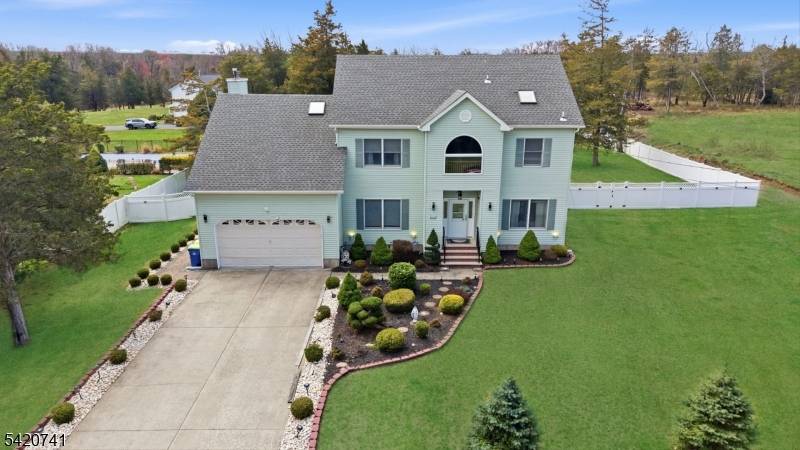 Spacious and well maintained NE facing Colonial located at the end of a desirable street in Somerset, offering privacy, space, and a truly exceptional backyard.