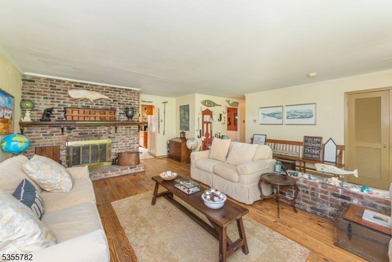 Beautifully Designed and Very Spacious Custom Cape on a 1 Acre Wooded Lot next to the Patriots Path located 1 Mile from Black Oak Golf Club.