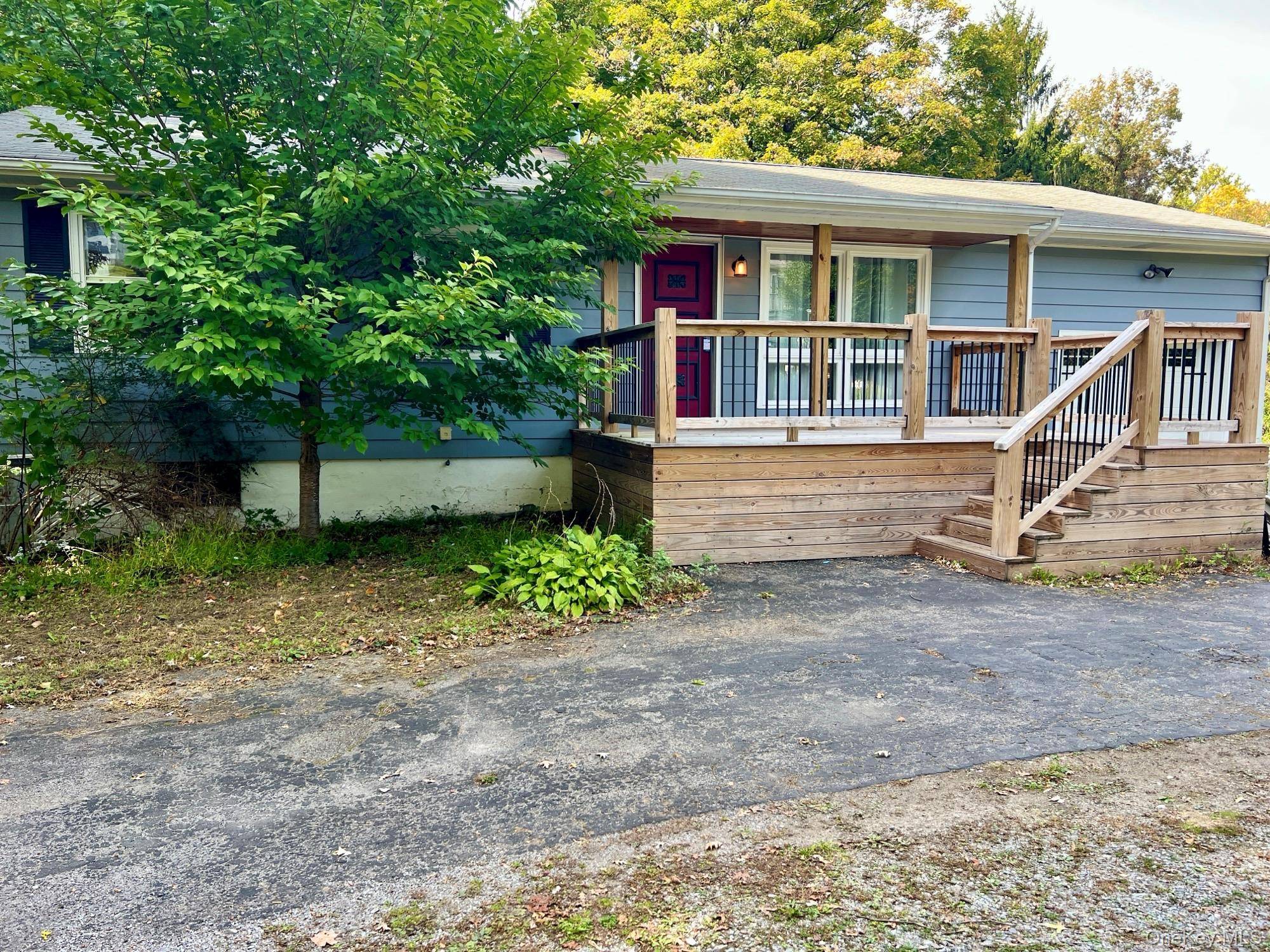 Charming 3 bedroom ranch in picturesque setting.