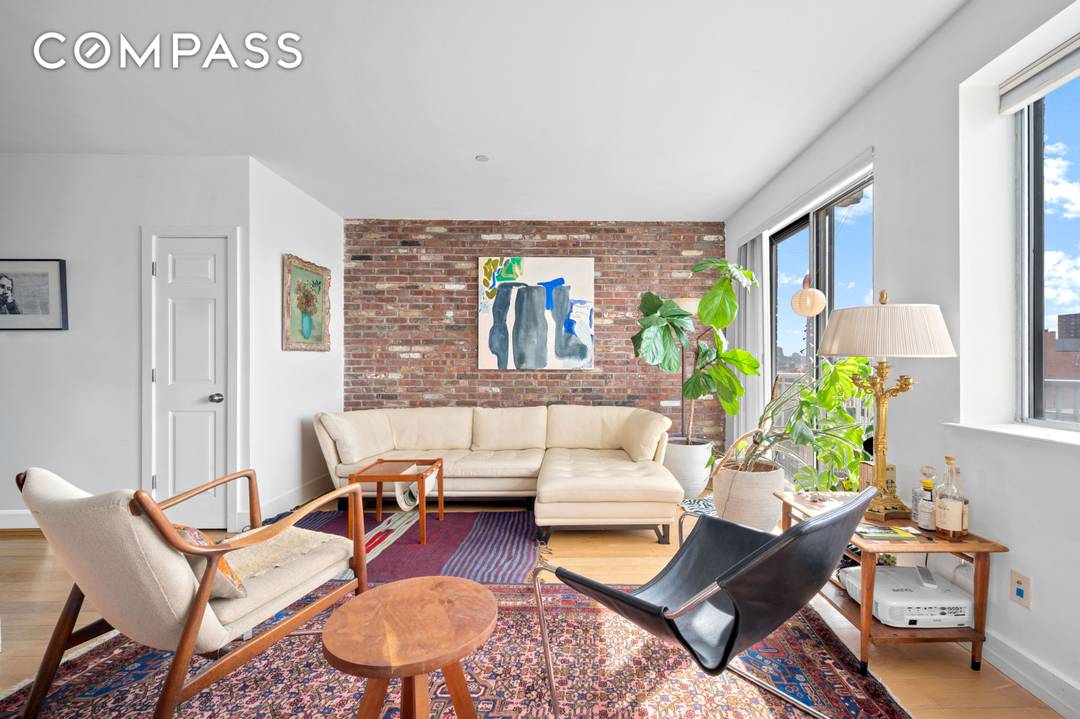 Rare one bedroom condo with three private outdoor spaces and skyline views.