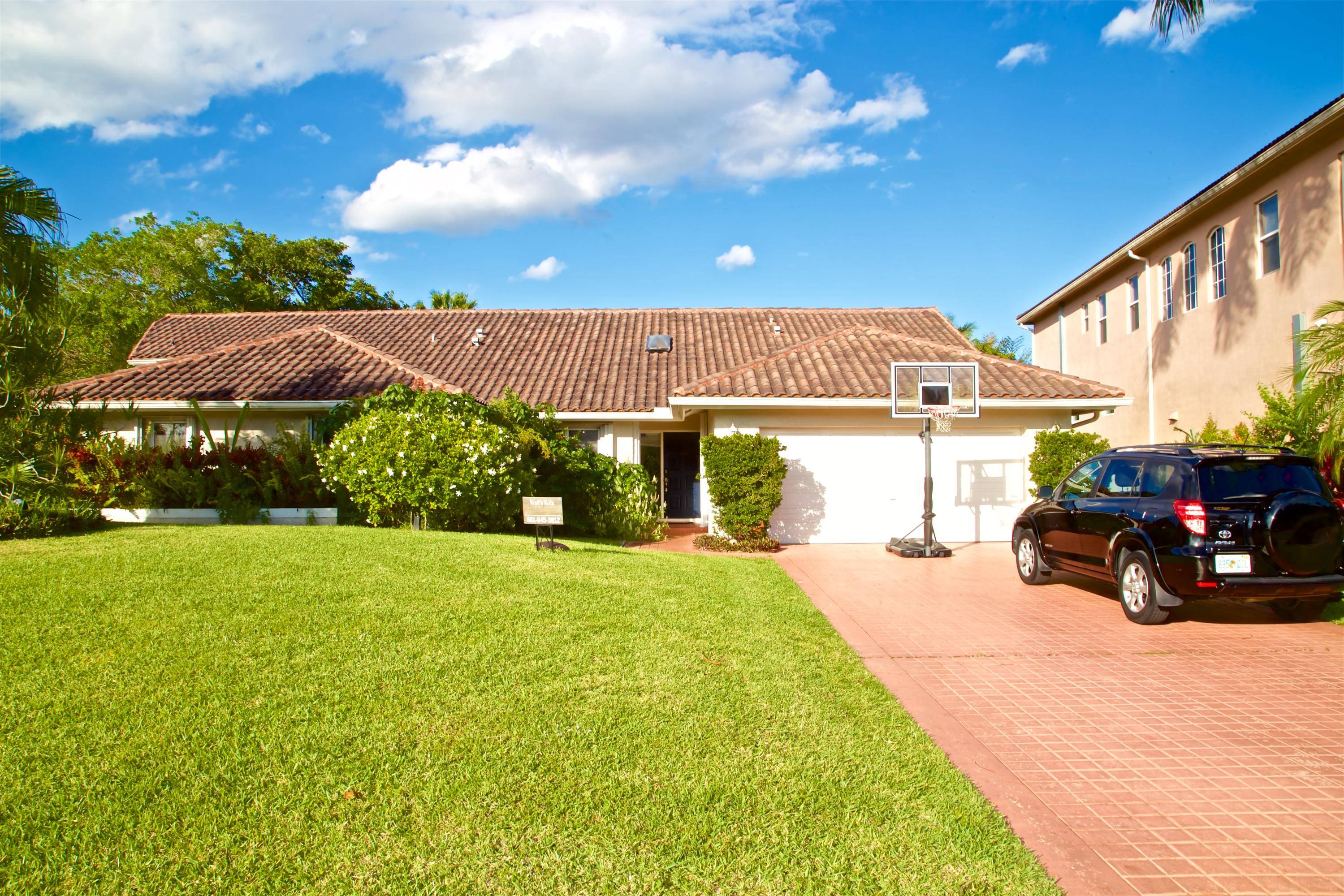 Enjoy Florida in this rare, beautiful, large, 6 bedroom and 3 1 2 bathroom home that is move in ready.