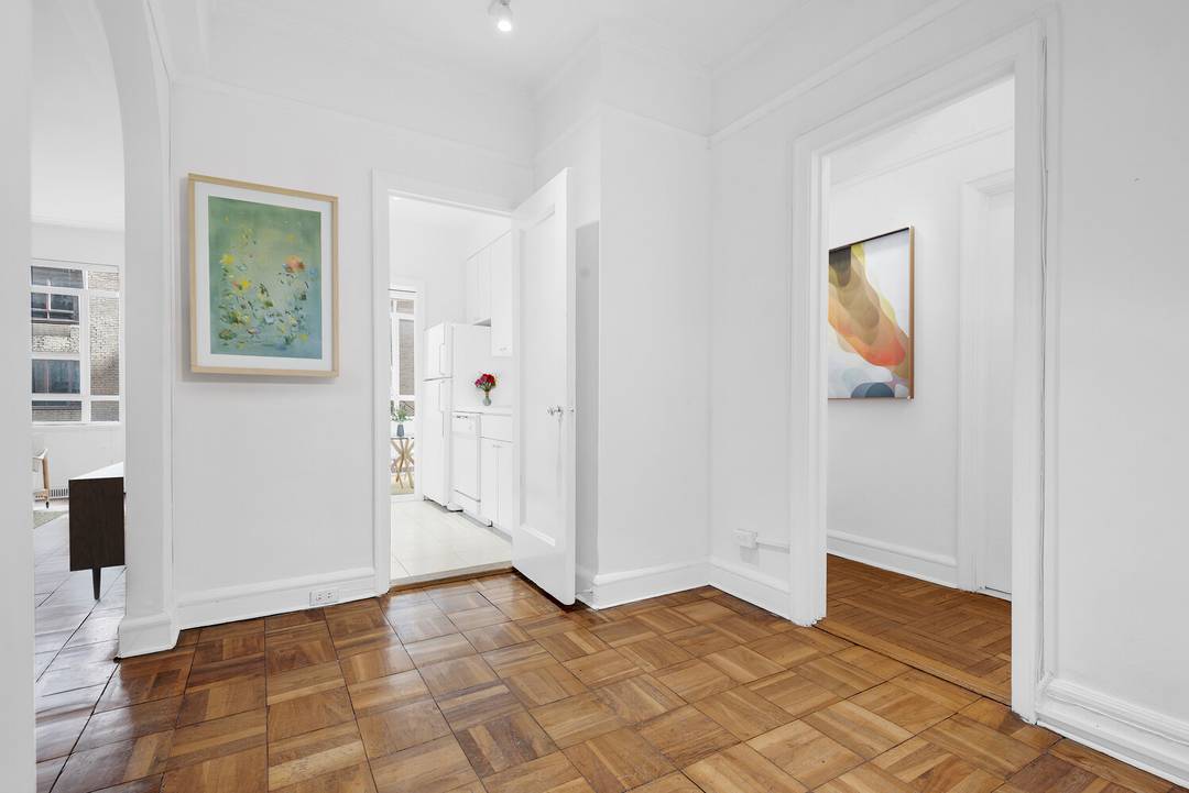 A light filled one bedroom one bath apartment at The Century Condominium includes a large entry foyer with great closet space.