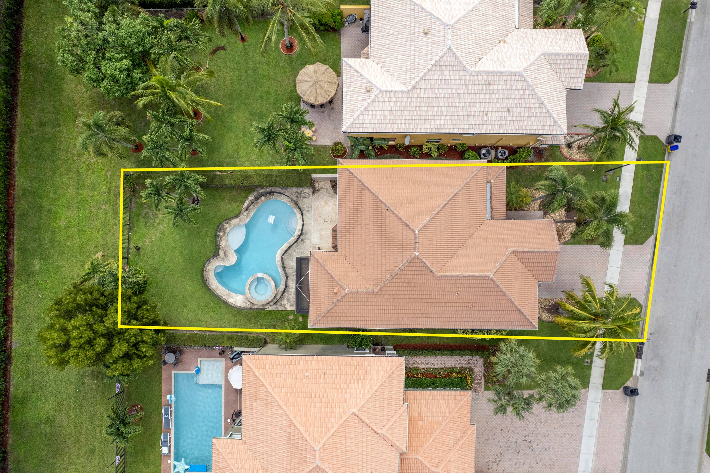 This Large, meticulous and beautiful home is located in a quiet community near the Equestrian horse show ground in Wellington Shores.