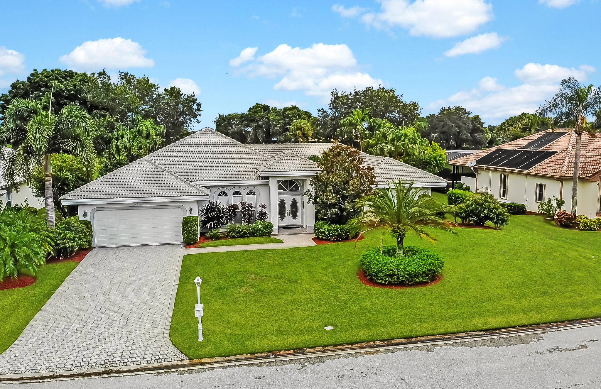 Welcome to this stunning 3 2 2 pool home nestled in sought after Country Club Estates.