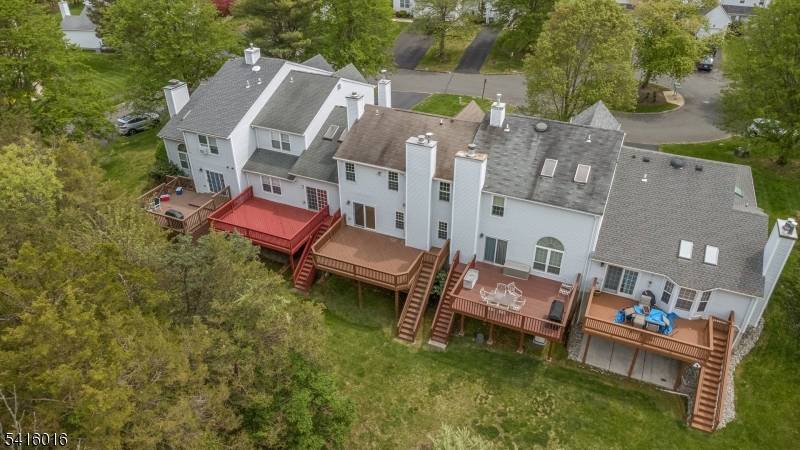 Nestled on a cul de sac backing up to the woods in a vibrant community is this Gem.