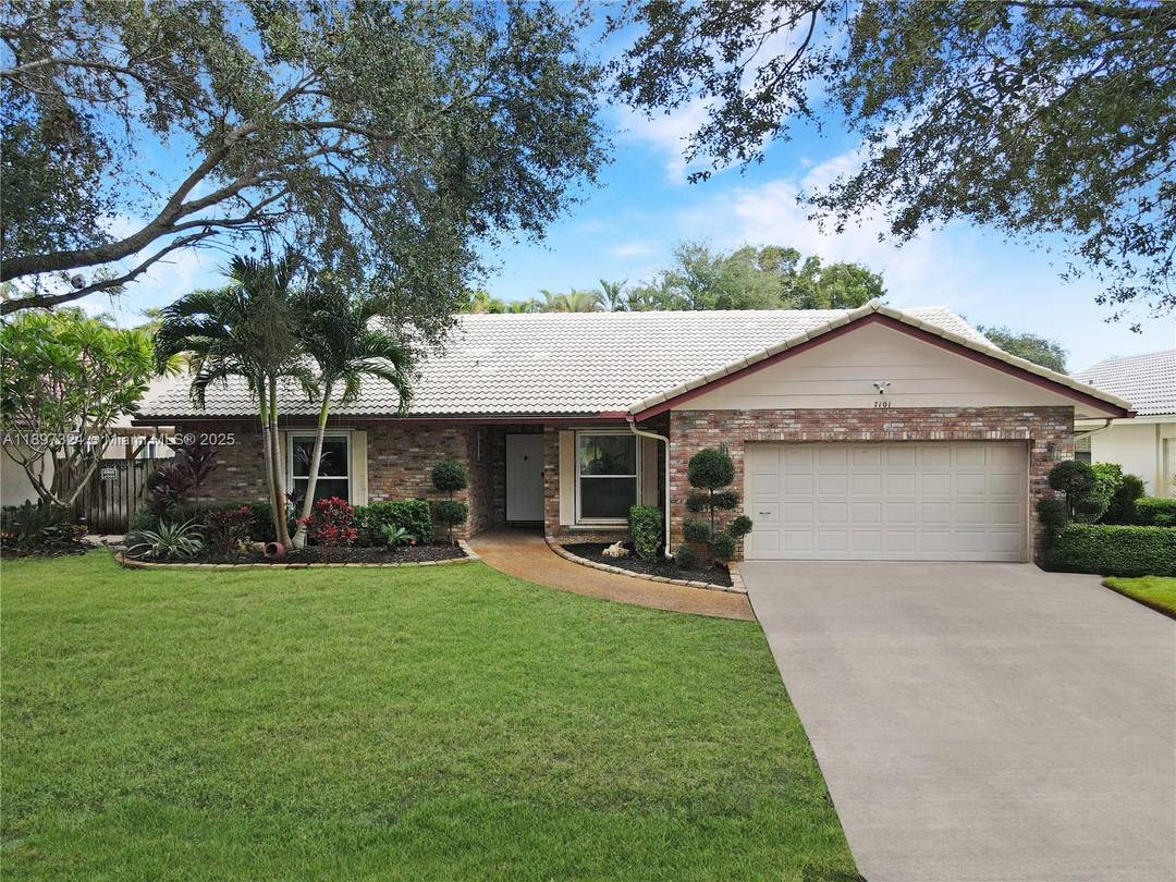Stunning, move in ready 3BD 2BA home with 2 car garage on a quiet, tree lined street in one of Coral Springs most desirable neighborhoods.