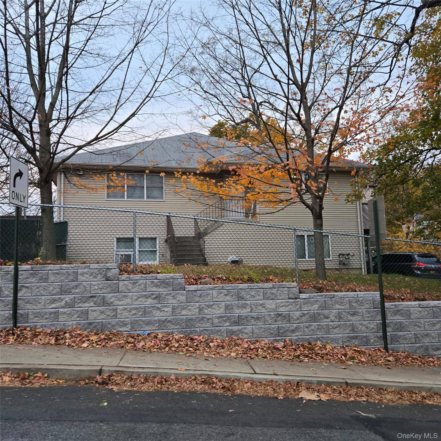 THIS HOME WAS BUILT IN 1998 AND HAS 2 FINISHED FLOORS AND A WALKUP ATTIC.
