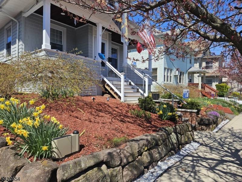 Welcome to this charming Cape Cod style home nestled in one of the most desirable neighborhoods of Belleville.