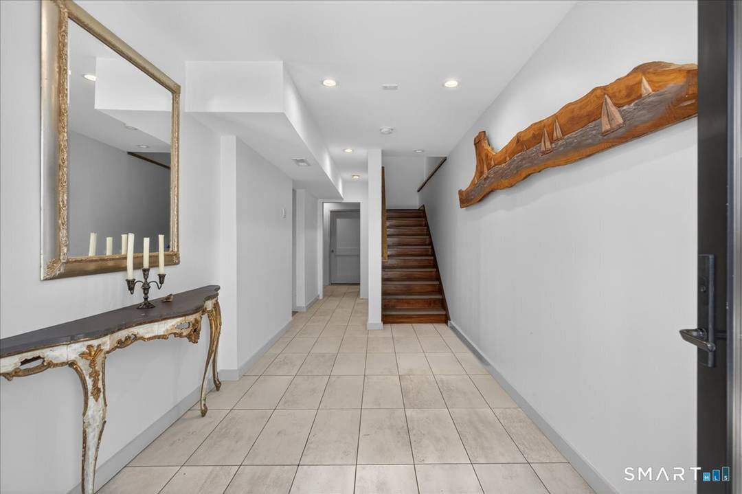 Modern new construction in an exceptional Milford location with 3 bedrooms, 2 full baths just one block from Silver Sands State Park Milford's famous boardwalk !