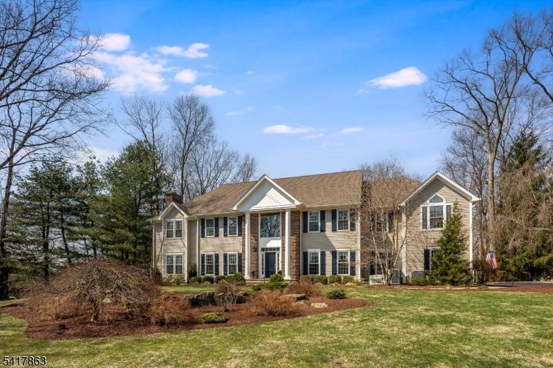 Set on a quiet and picturesque cul de sac in desirable Chester Twp, this beautifully maintained residence presents itself with poise and refinement.
