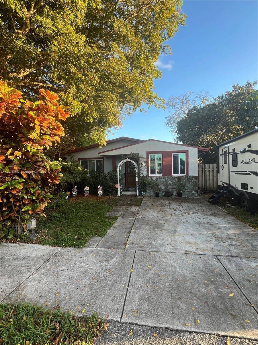 Newly painted well maintained 4 bedroom 2 bath home in the heart of West Park !
