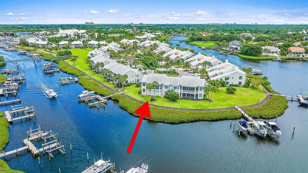 Location Location Location This renovated unit is conveniently located within walking distance to The Club, World Class Spa, Pickle Ball Tennis and your own dock.